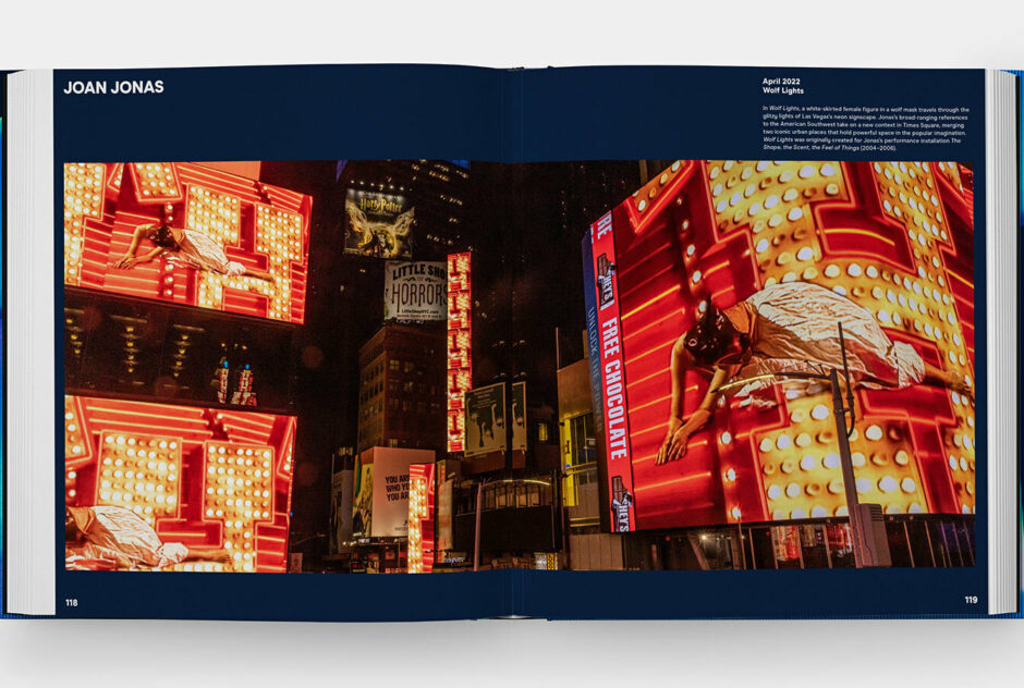 A spread of pages from the book "Midnight Moment: A Decade of Artists in Times Square" featuring the work of Joan Jonas.