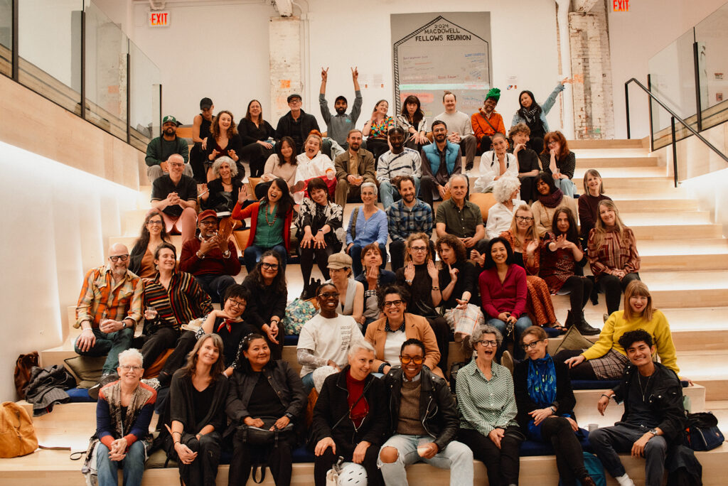 Fellows pose for a celebratory group photo