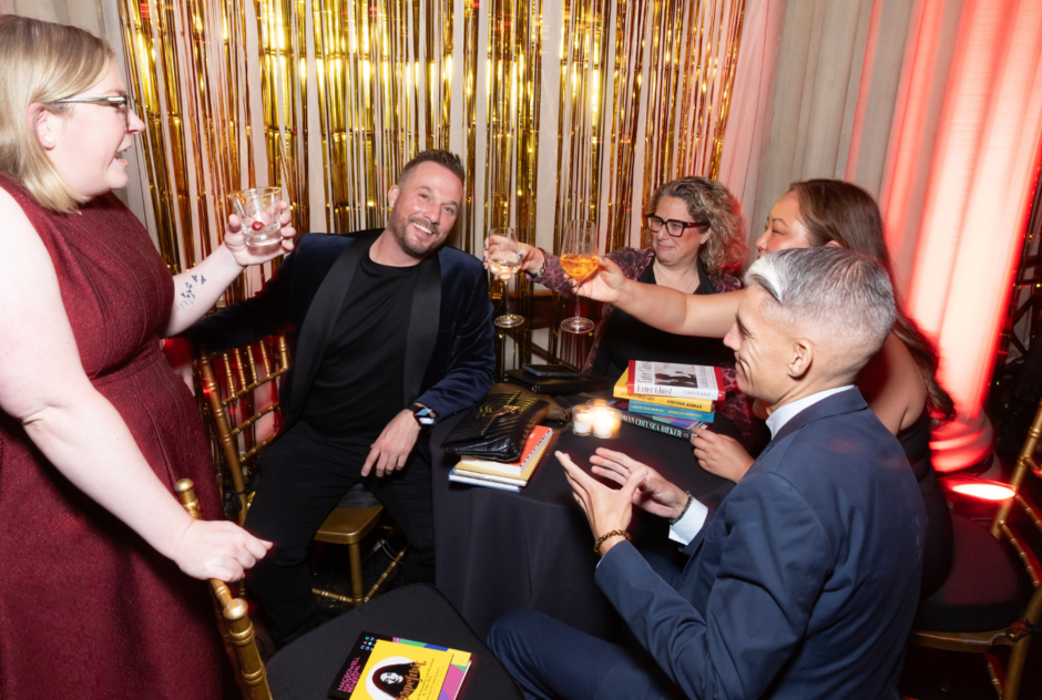 A table of people relax at the end of the night with drinks