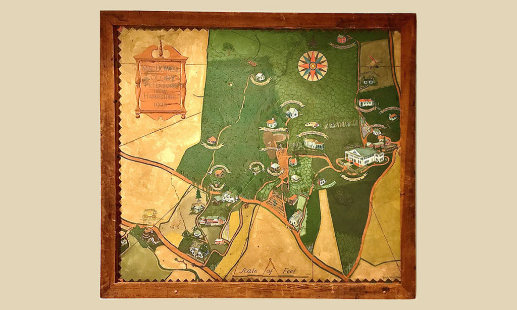 A large, hand painted map of MacDowell from the 1900s. The painting is framed with unfinished wood.